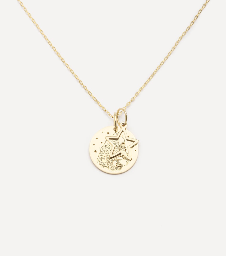 Symboliczny złoty naszyjnik